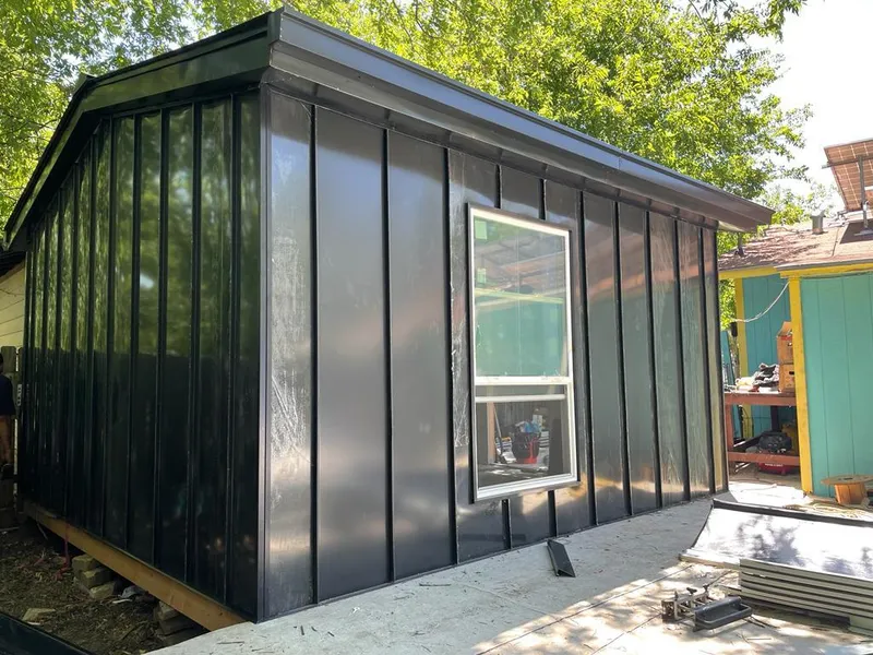 Black standing seam metal wall panels for Roof Inspection in Prairie Ridge