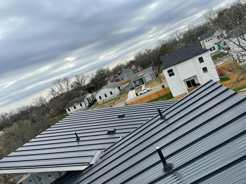 Standing seam metal roof panels with vents for Skylight Repair in Prairie Ridge